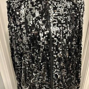Brand new ladies size large sequin baseball jacket. Two colors black and silver